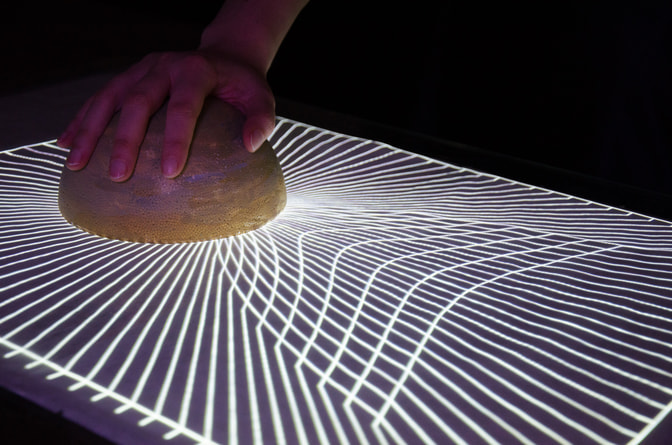 Gravitation of jupiter on tangible table